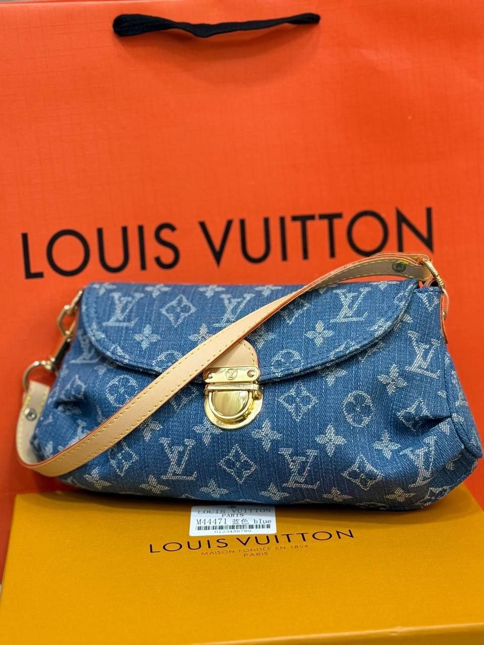 Louis Vuitton - Block Soly