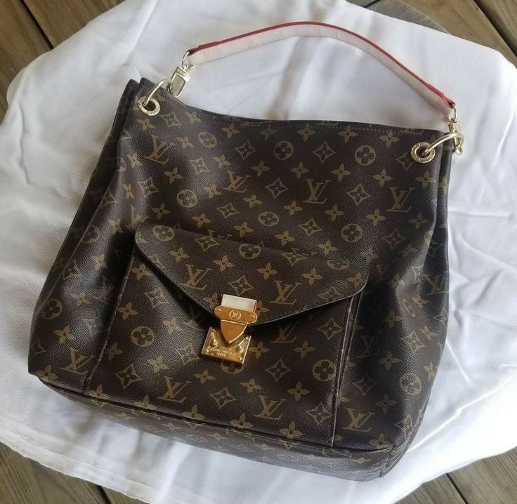 Louis Vuitton - Block Soly