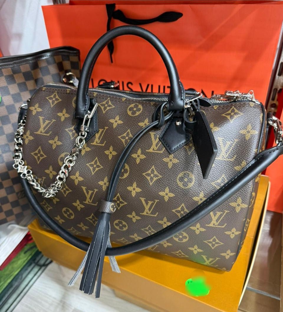 Louis Vuitton - Block Soly