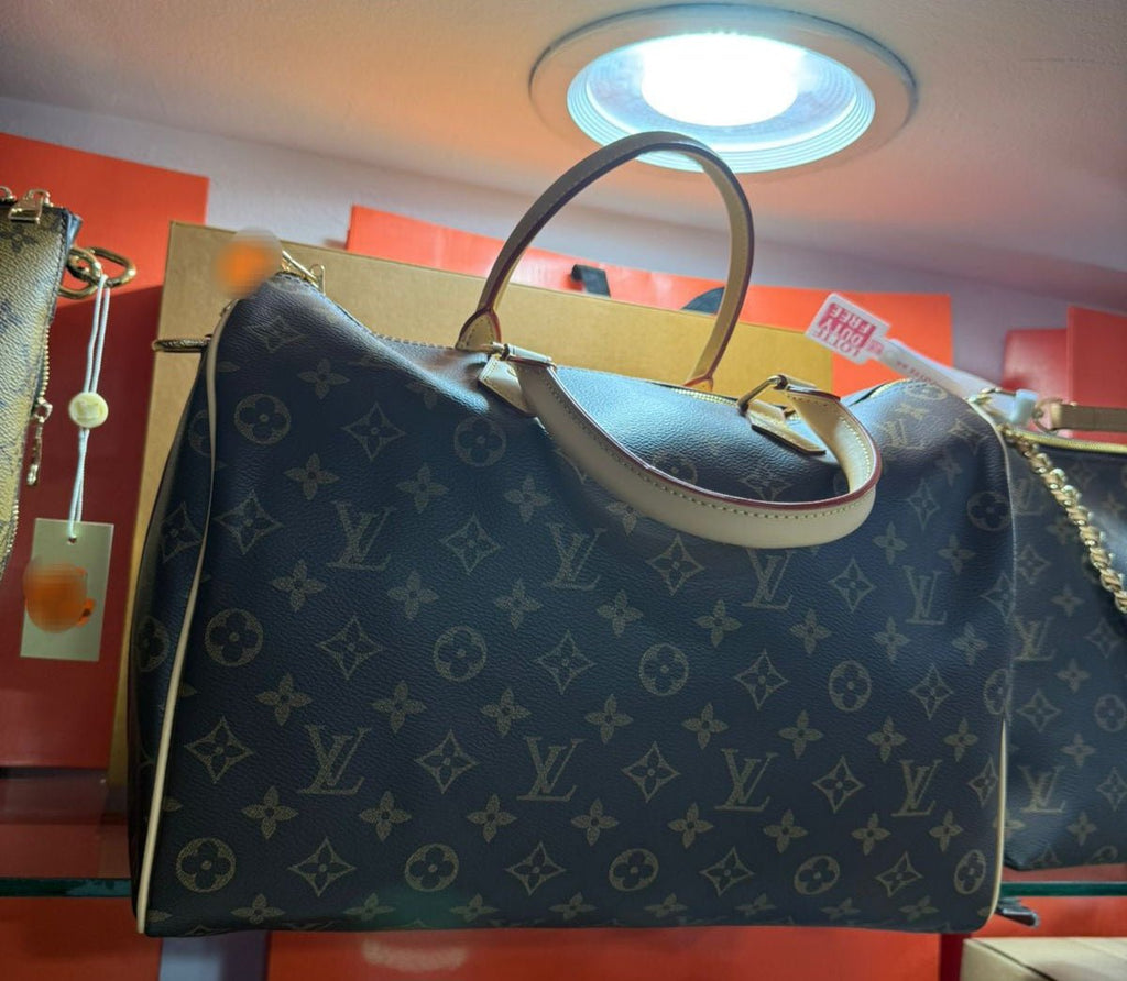 Louis Vuitton - Block Soly
