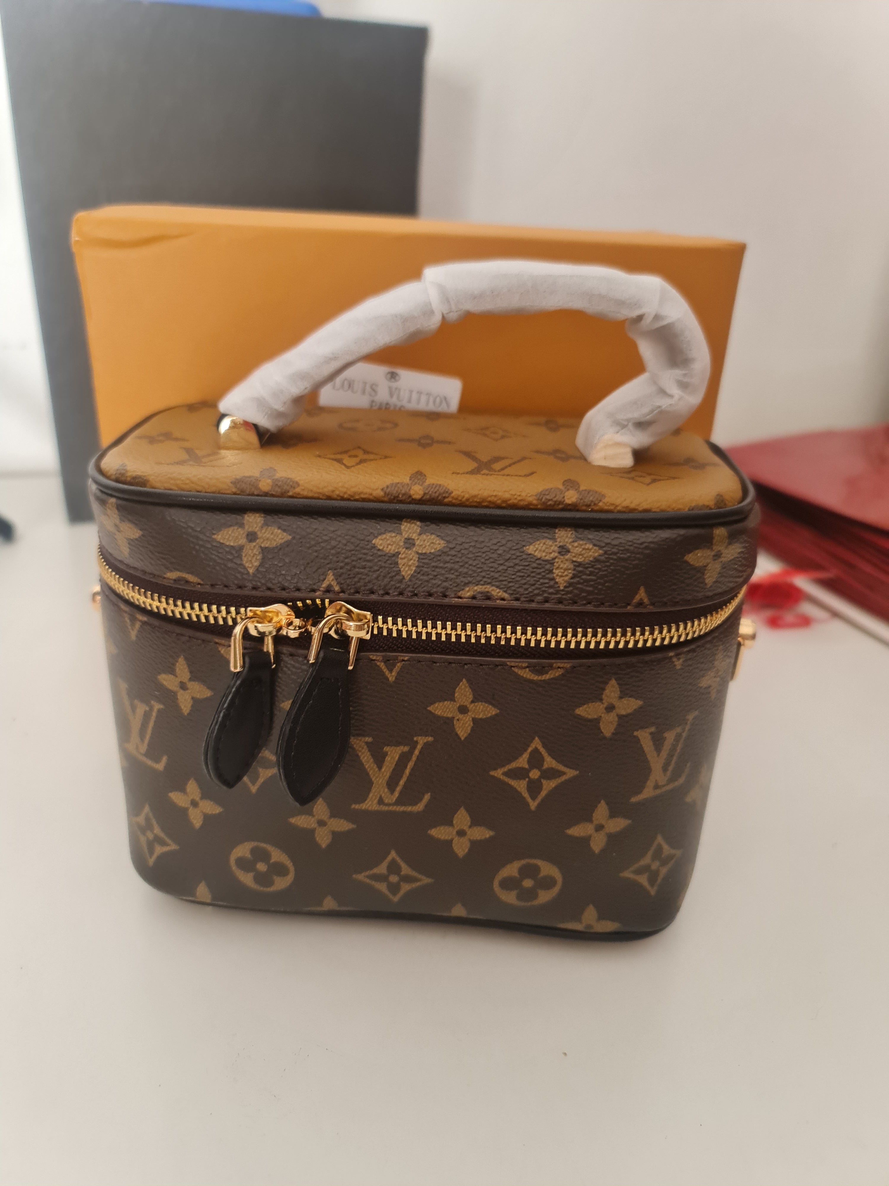 Louis Vuitton - Block Soly